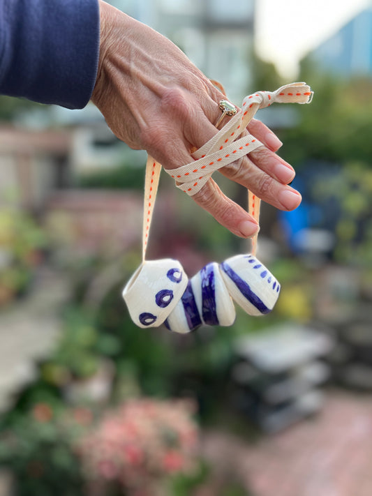 chunky thrown bead & cobalt jewelry on twill orange & cream cord samples/seconds/sale piece