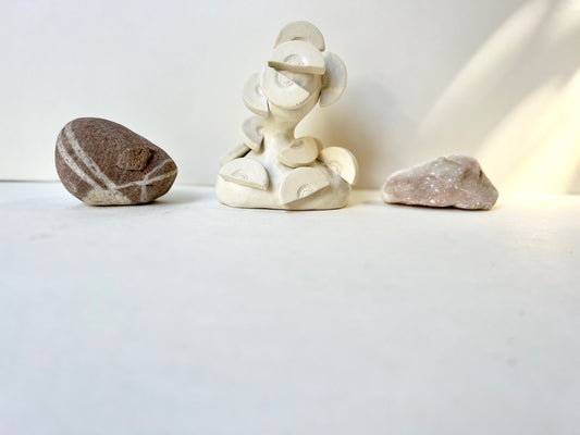 one of a kind ceramic statuette sculpture; fan folly piece