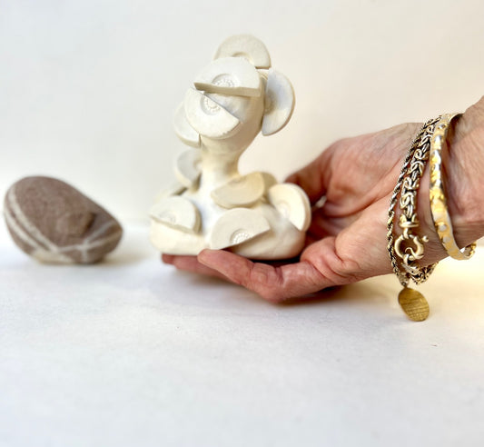 one of a kind ceramic statuette sculpture; fan folly piece