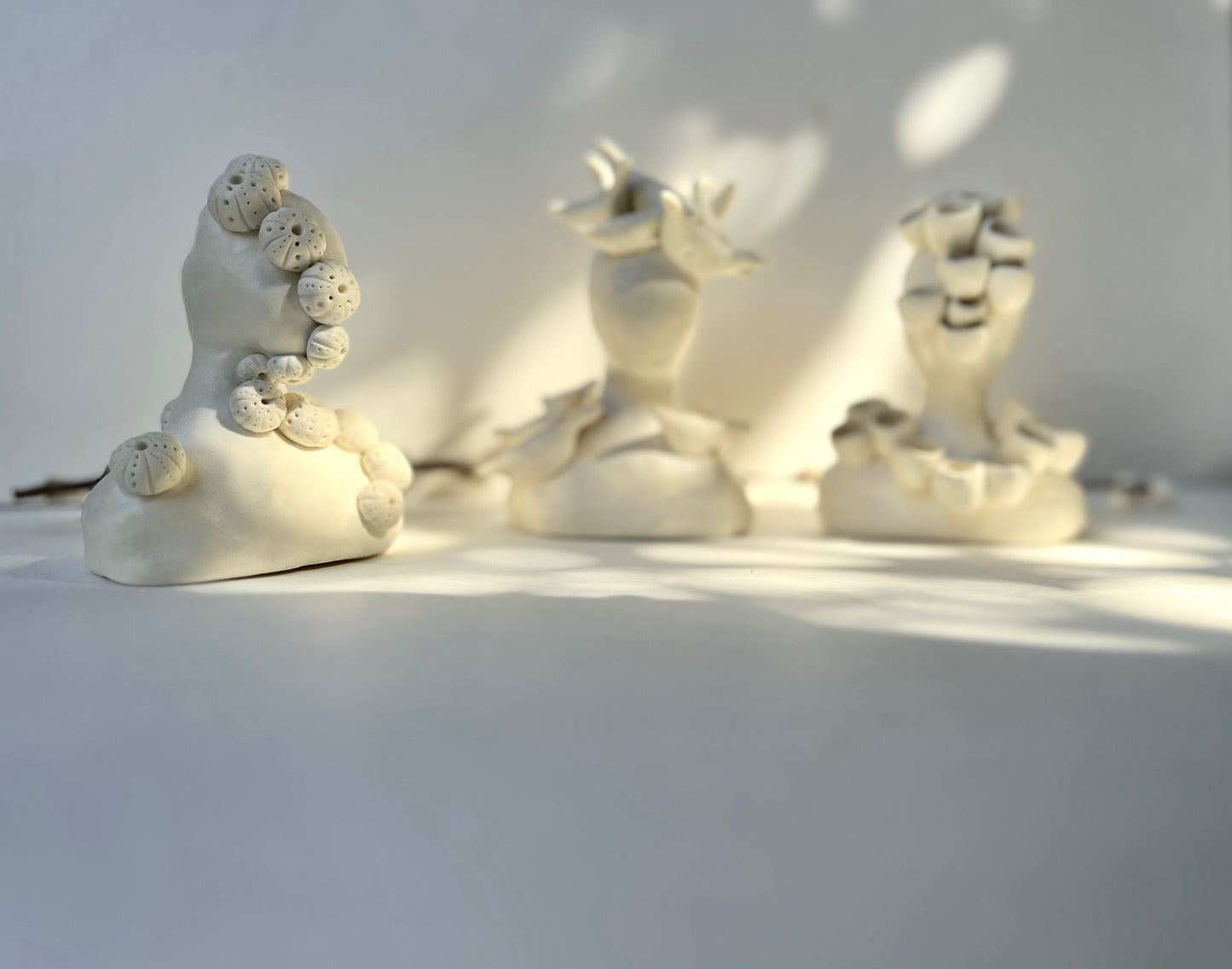 one of a kind ceramic statuette sculpture; certain like the sea urchin piece