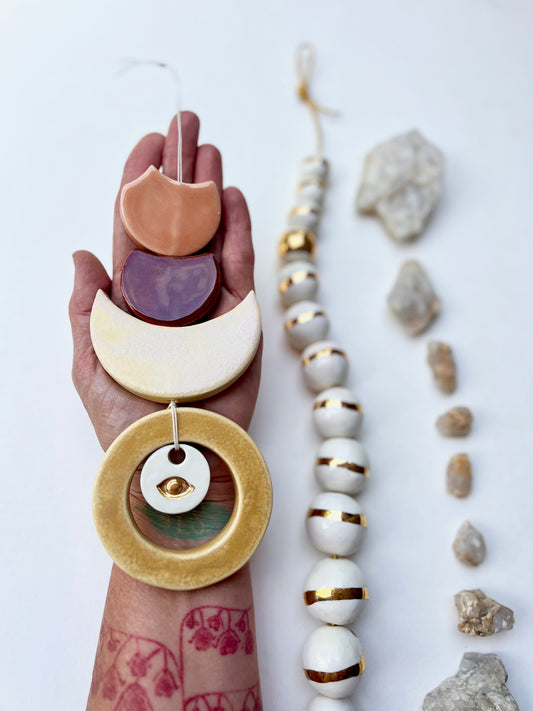 one of a kind 'graduating circles' talisman moon wall hanging