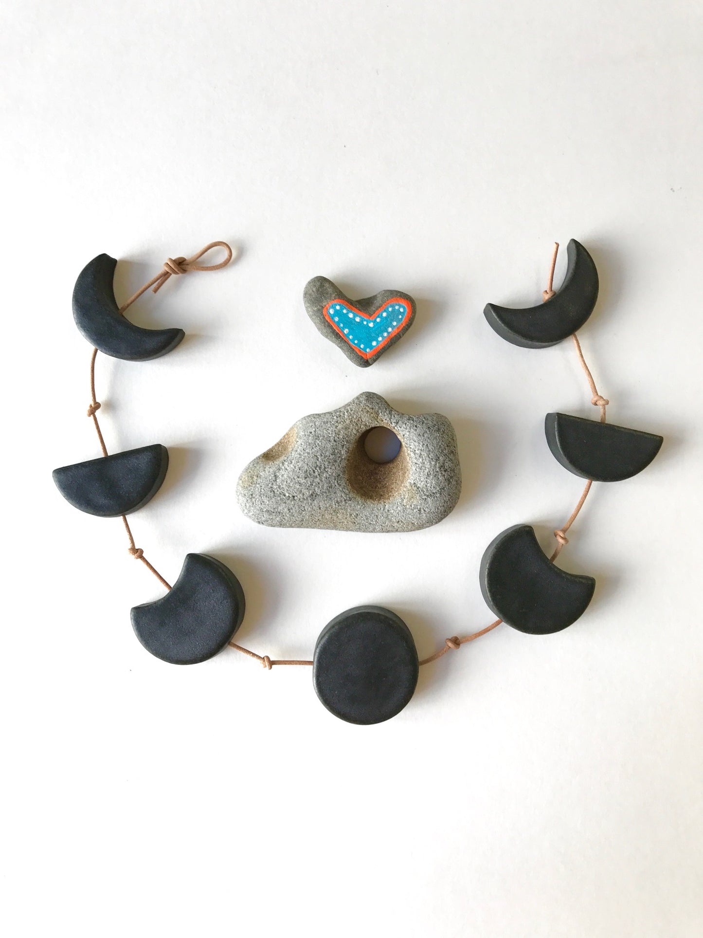 silvered sky & earth; matte white ceramic moon phases vertical wall hanging