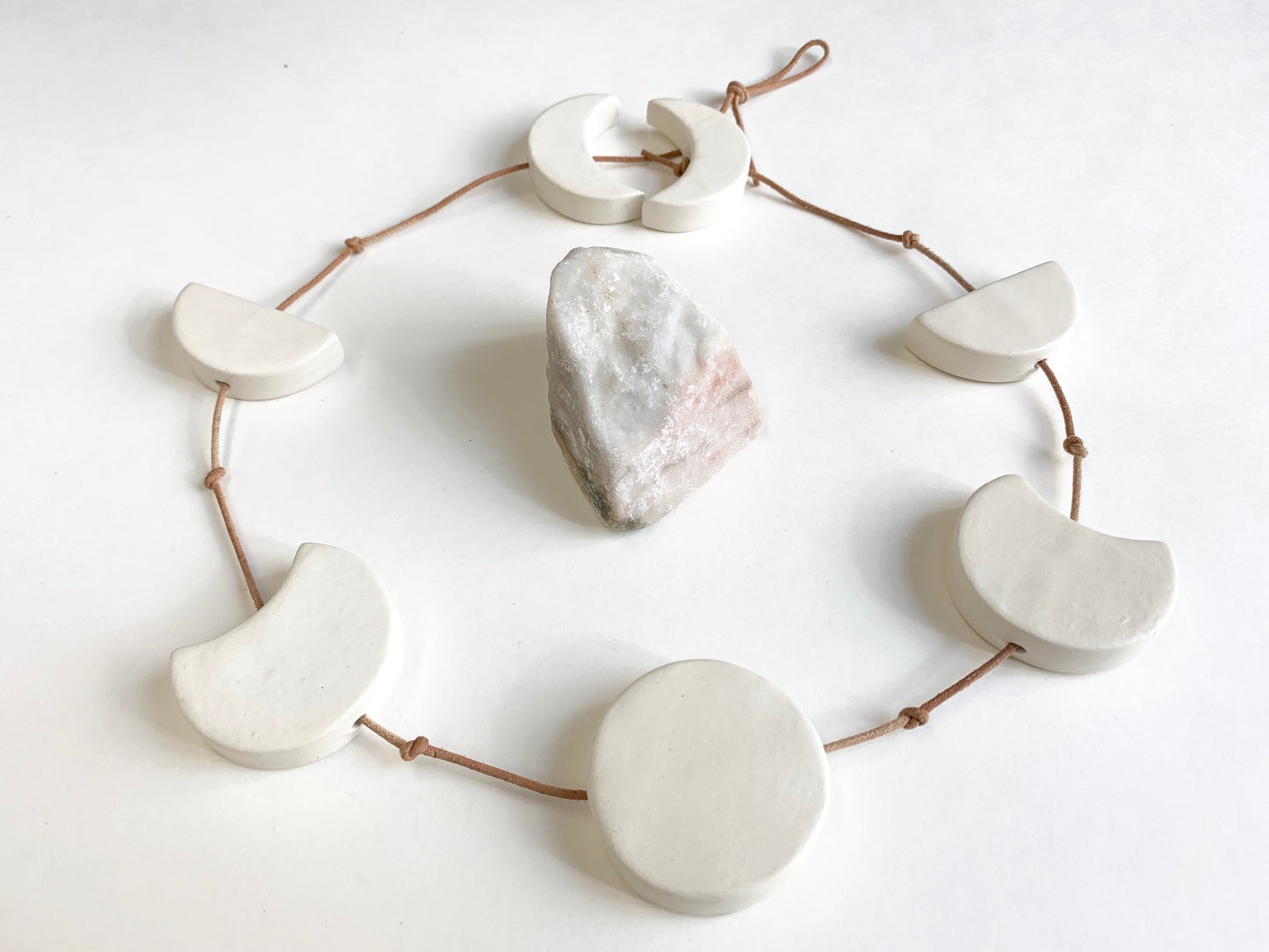 silvered sky & earth; matte white ceramic moon phases vertical wall hanging