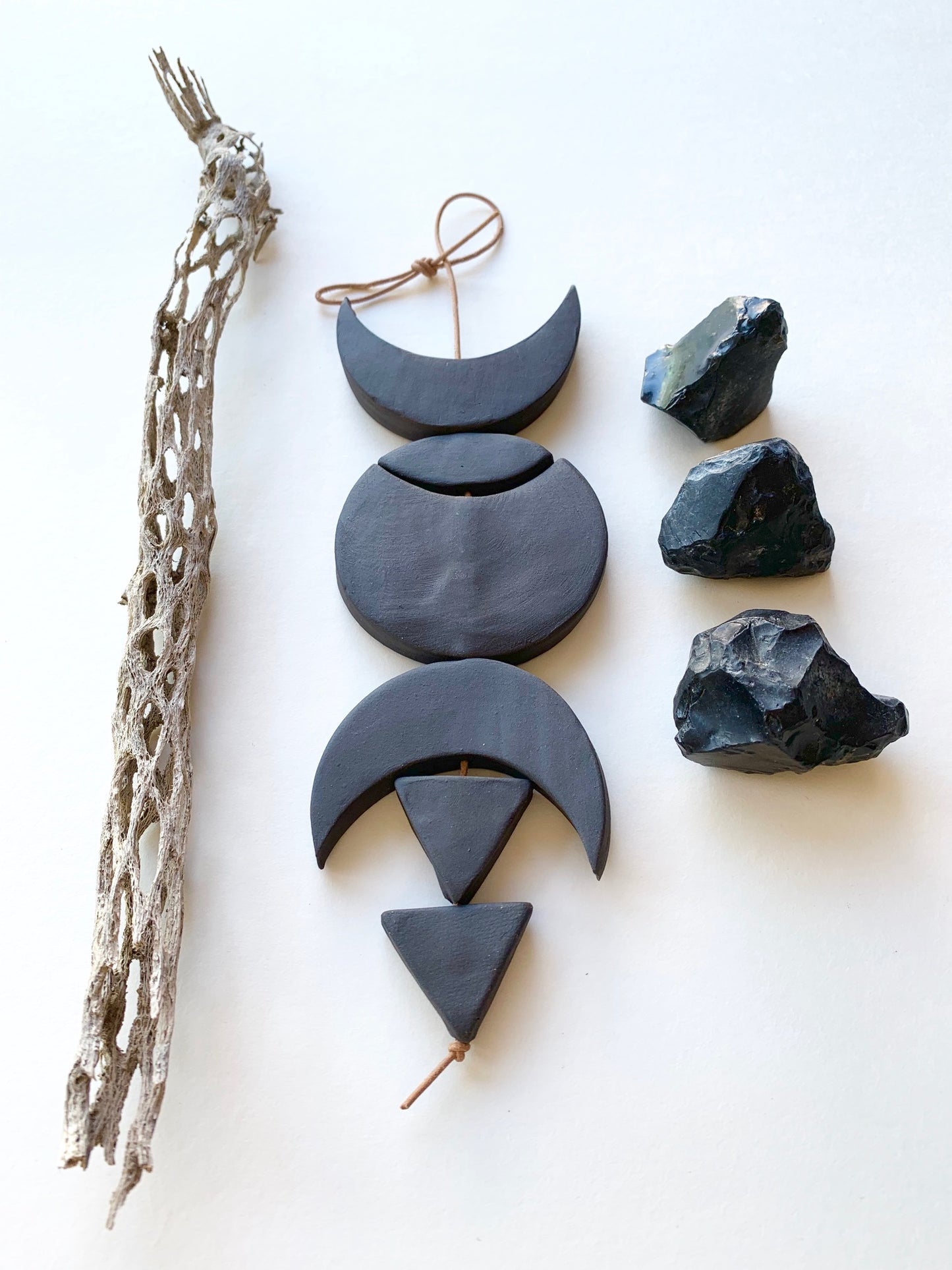 sold - one of a kind, black magic ceramic hanging