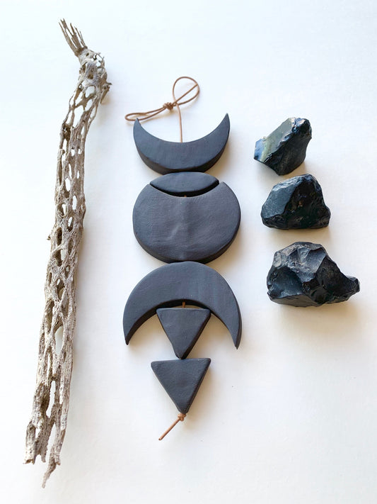 sold - one of a kind, black magic ceramic hanging