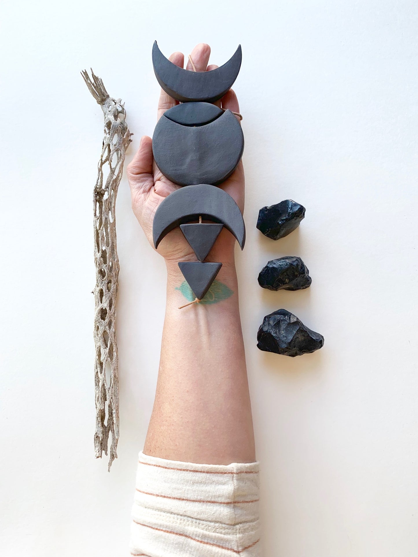 sold - one of a kind, black magic ceramic hanging