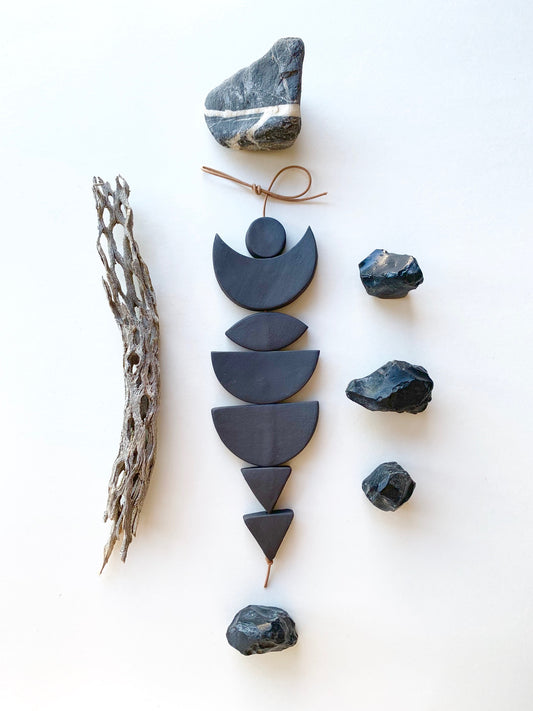 sold - one of a kind, black magic ceramic hanging