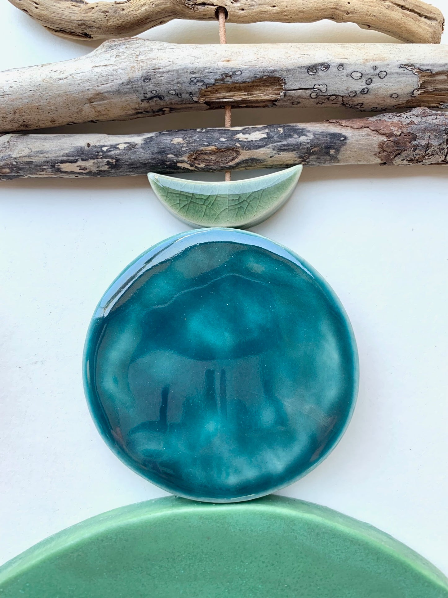 sold - one of a kind 'sea foam moons' ceramic hanging piece