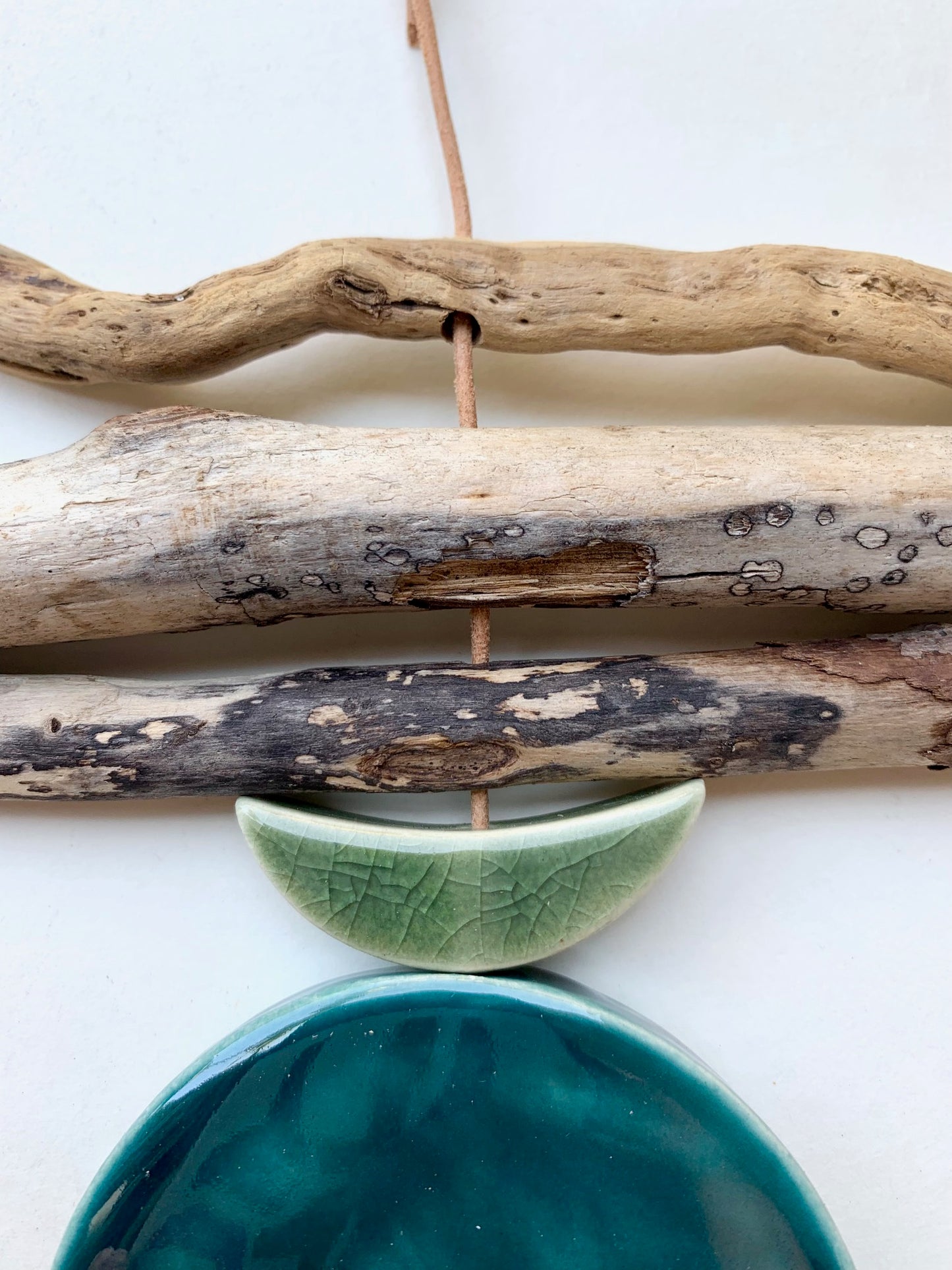 sold - one of a kind 'sea foam moons' ceramic hanging piece