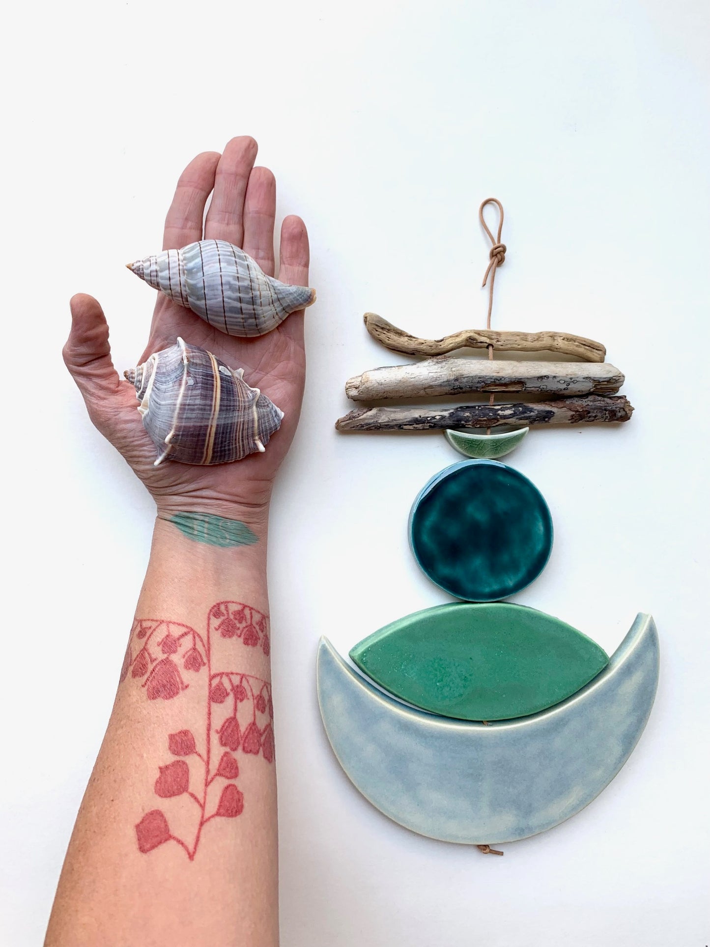 sold - one of a kind 'sea foam moons' ceramic hanging piece