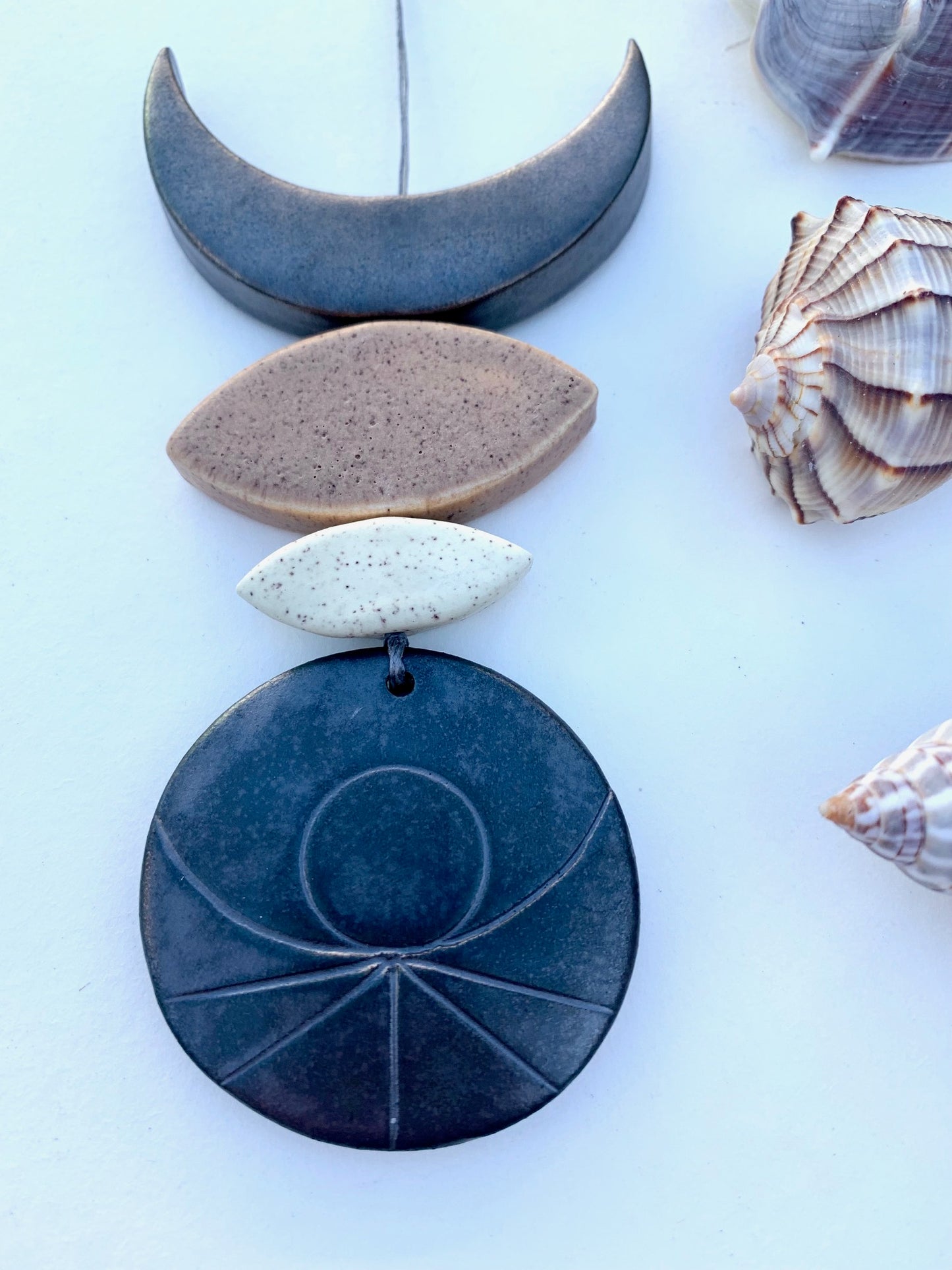 sold - one of a kind 'tidal child' hanging piece