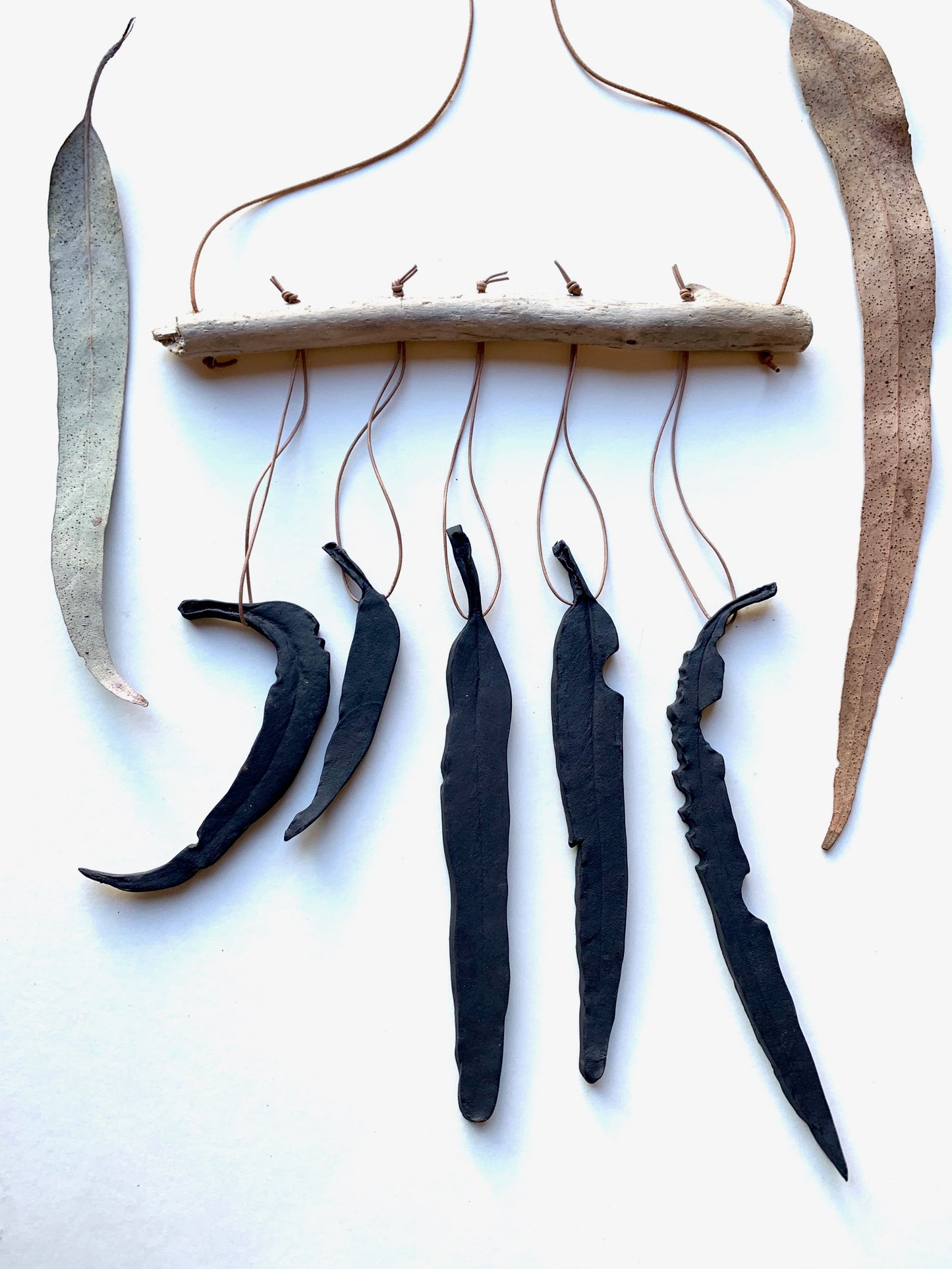 sold - black ‘clarity’ eucalyptus wall piece