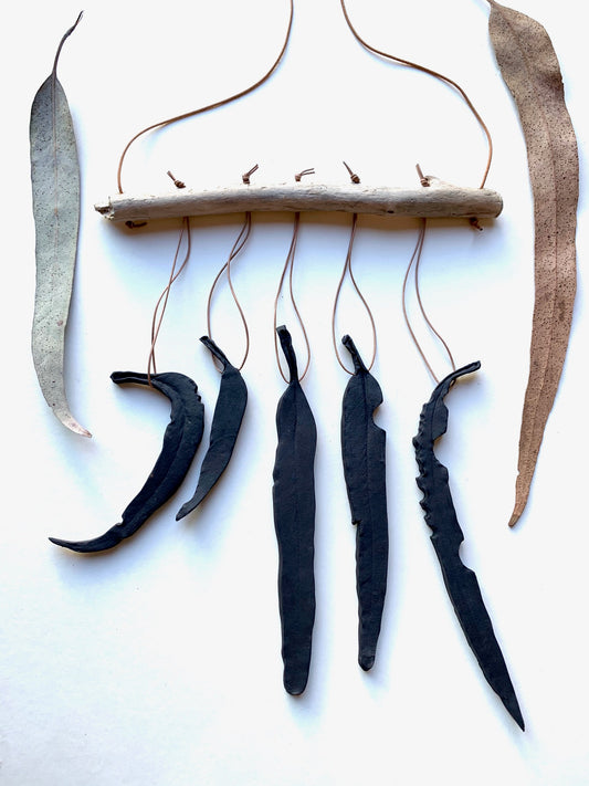 sold - black ‘clarity’ eucalyptus wall piece