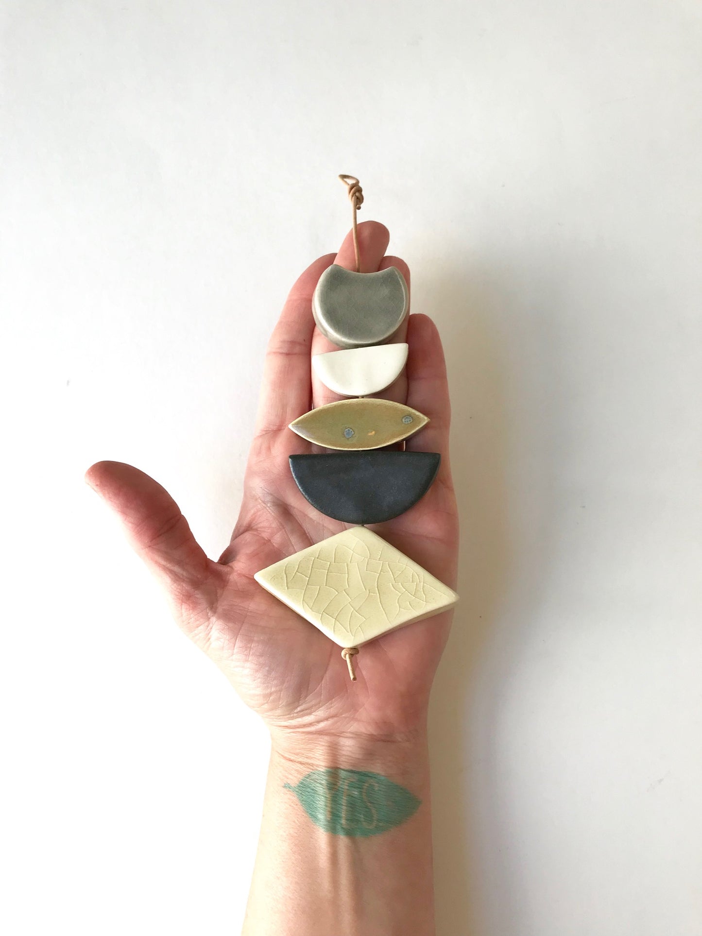 sold - one of a kind, desert rising ceramic wall piece