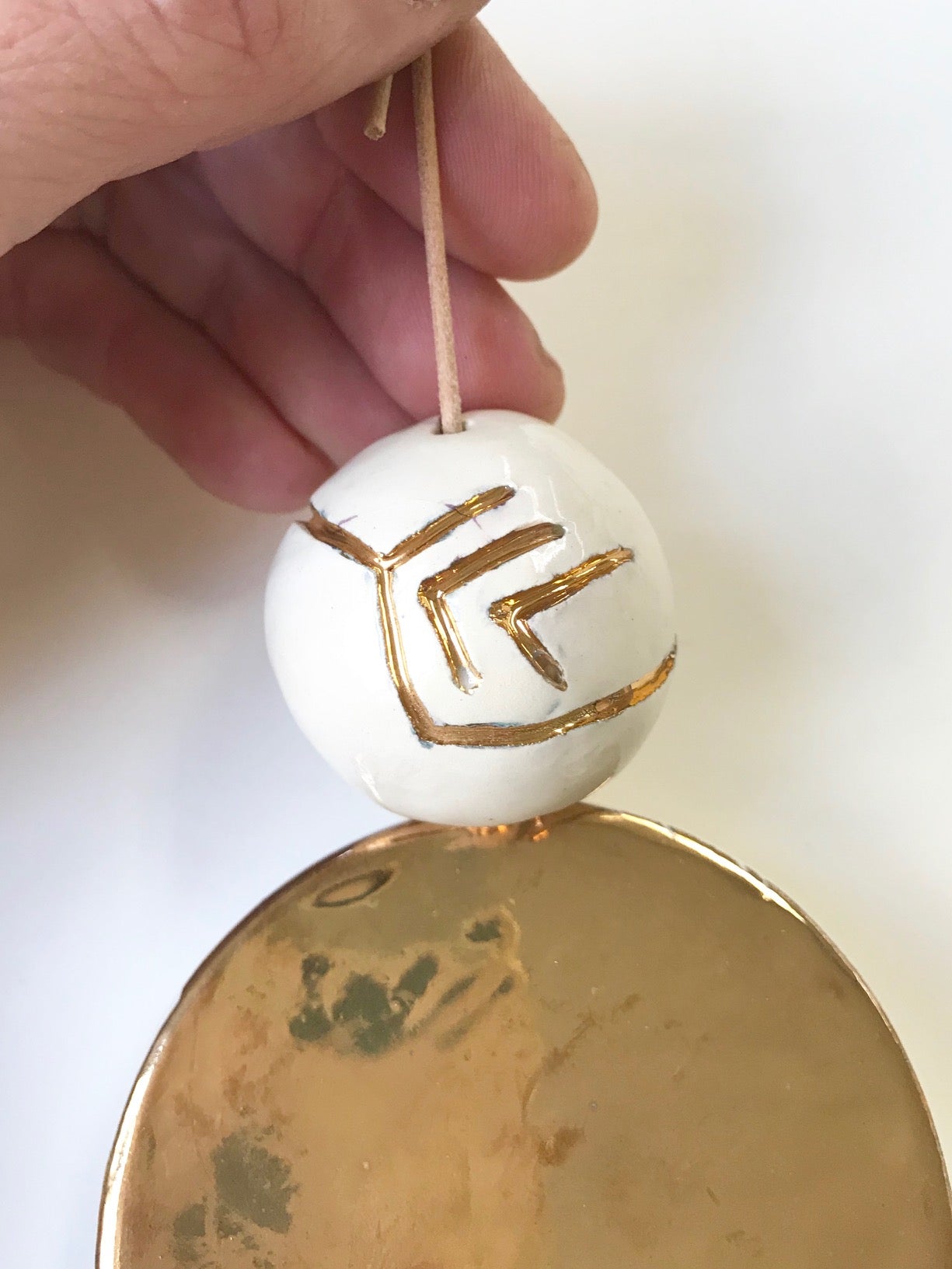 sold, aztec gold, quetzalcoatl wind, sky & stars talisman hanging