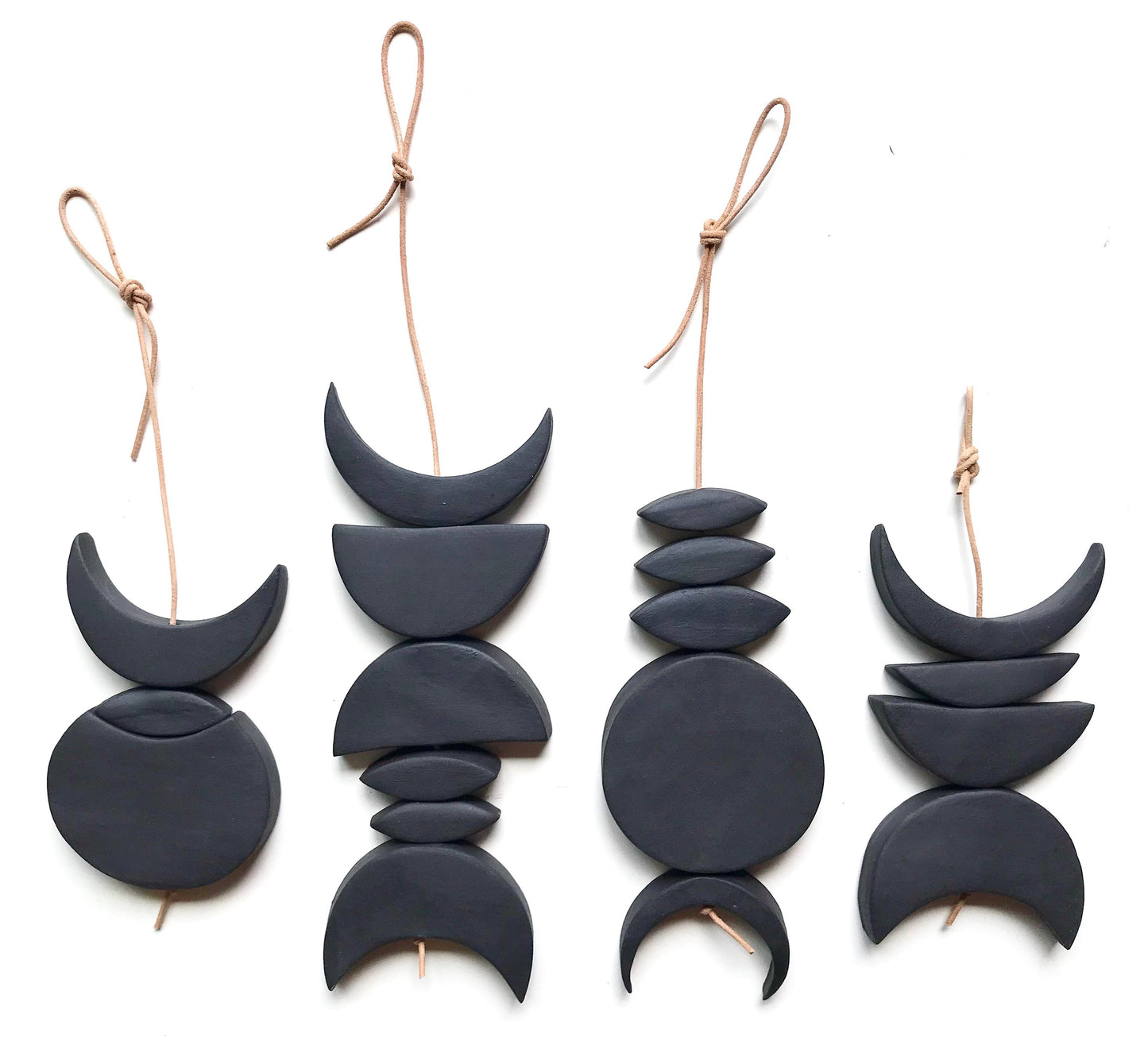 sold - one of a kind, black magic ceramic hanging
