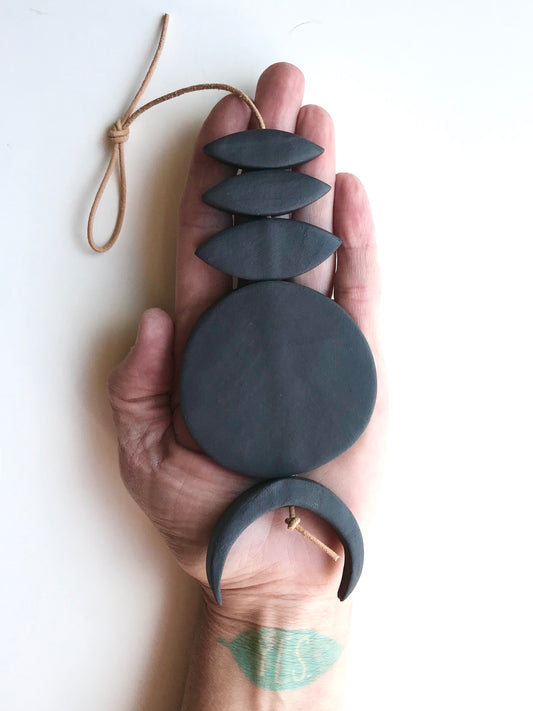 sold - one of a kind, black magic ceramic hanging