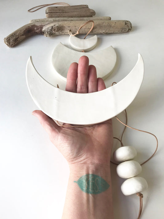 sold - ‘faithful moon’ one of a kind matte white moon piece