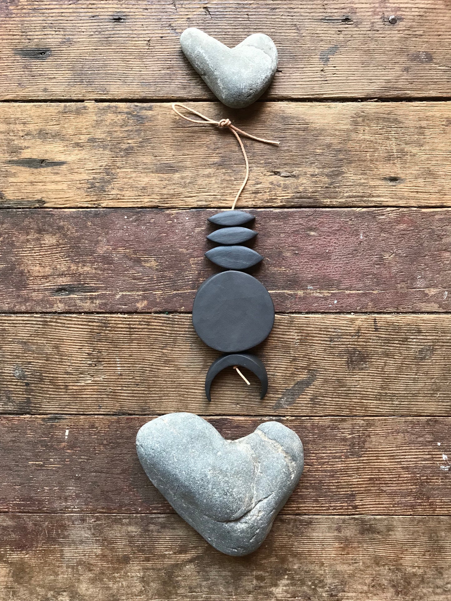 sold - one of a kind, black magic ceramic hanging