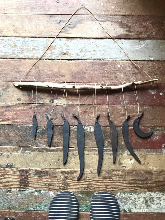 black ‘clarity’ eucalyptus wall hanging