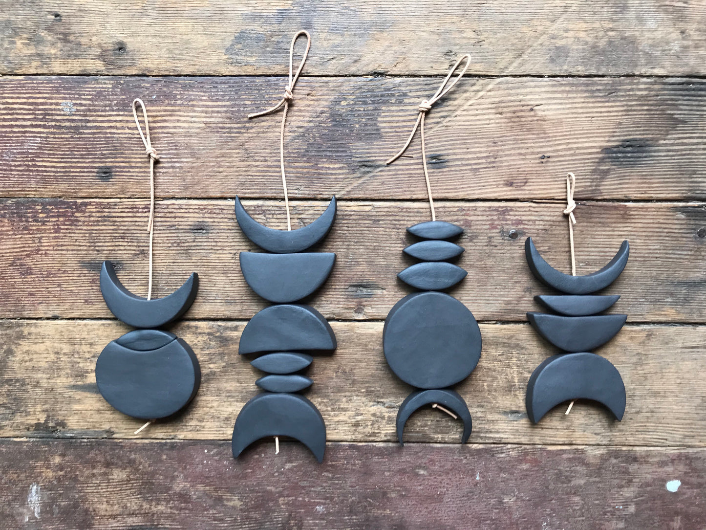 sold - one of a kind, black magic ceramic hanging