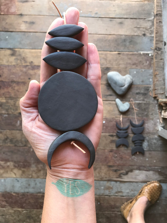 sold - one of a kind, black magic ceramic hanging