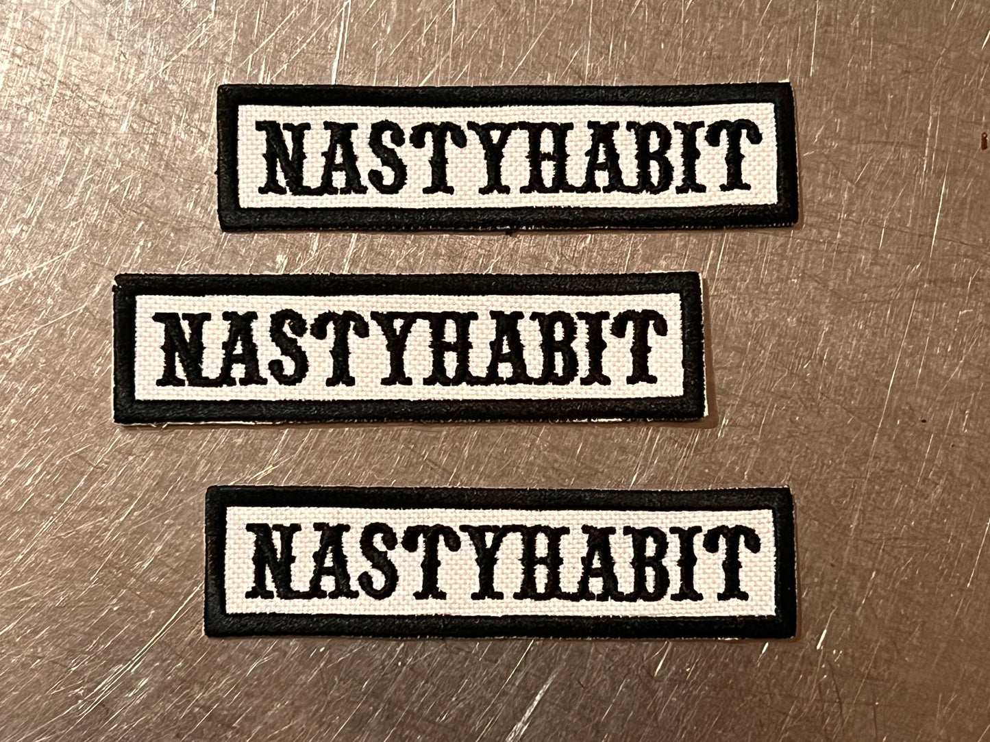 “NASTYHABIT” sew on embroidered patch
