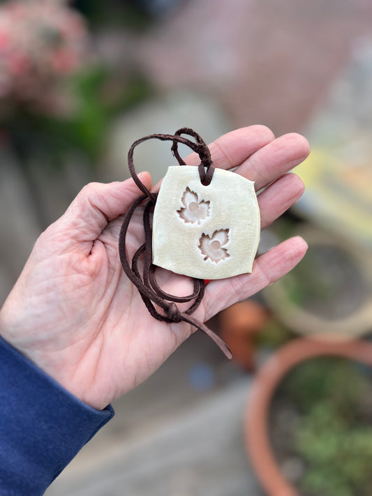 mocha cream & parchment crackle glaze leaf jewelry on soft brown leather samples/seconds/sale piece