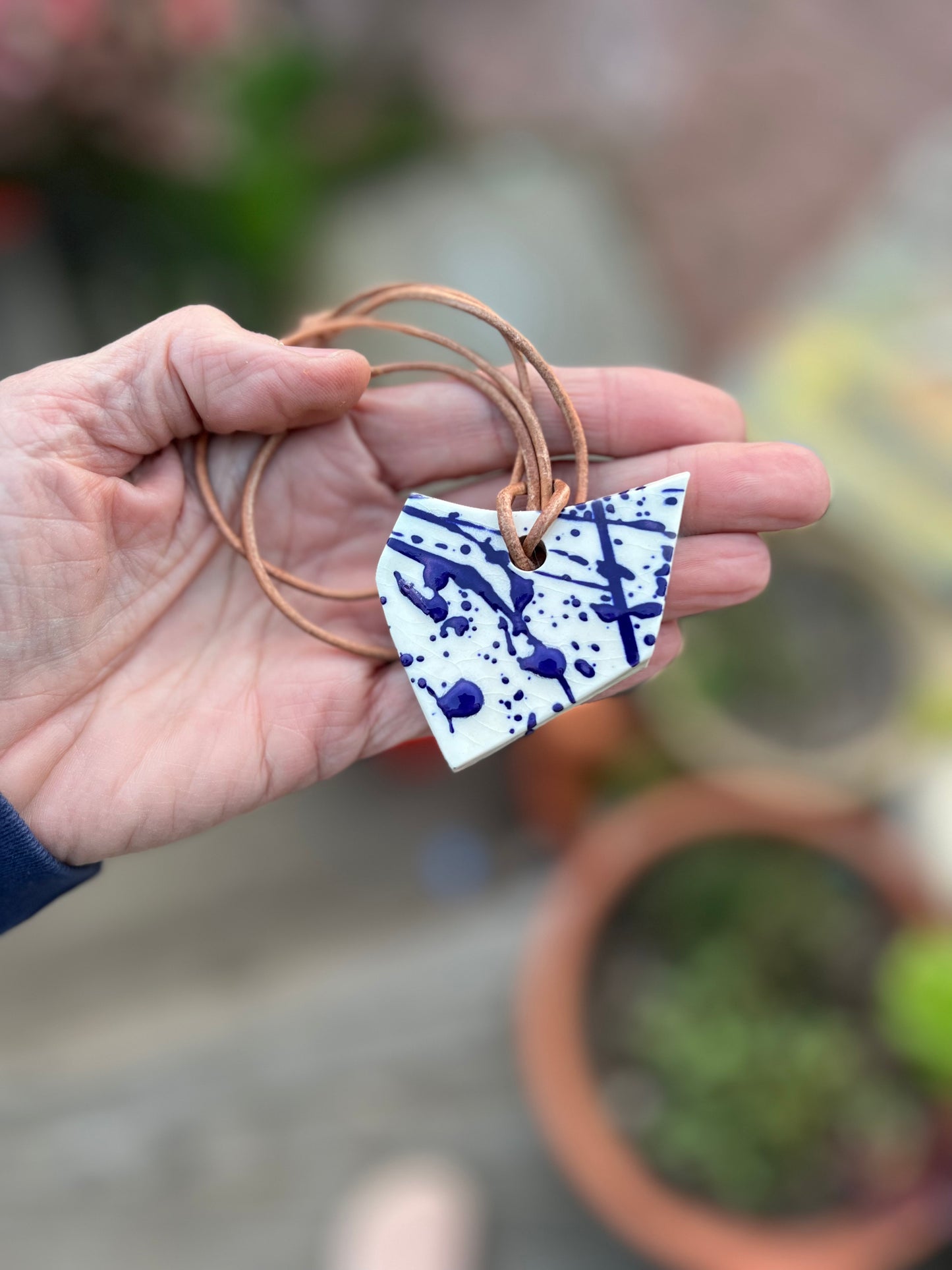 cobalt splatter jewelry on tan leather cord samples/seconds/sale piece