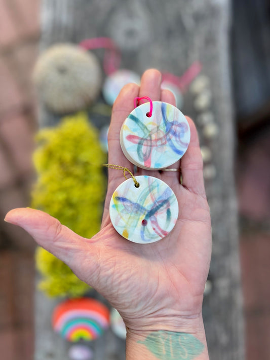 'tied up ribbons' circle swirl ornament