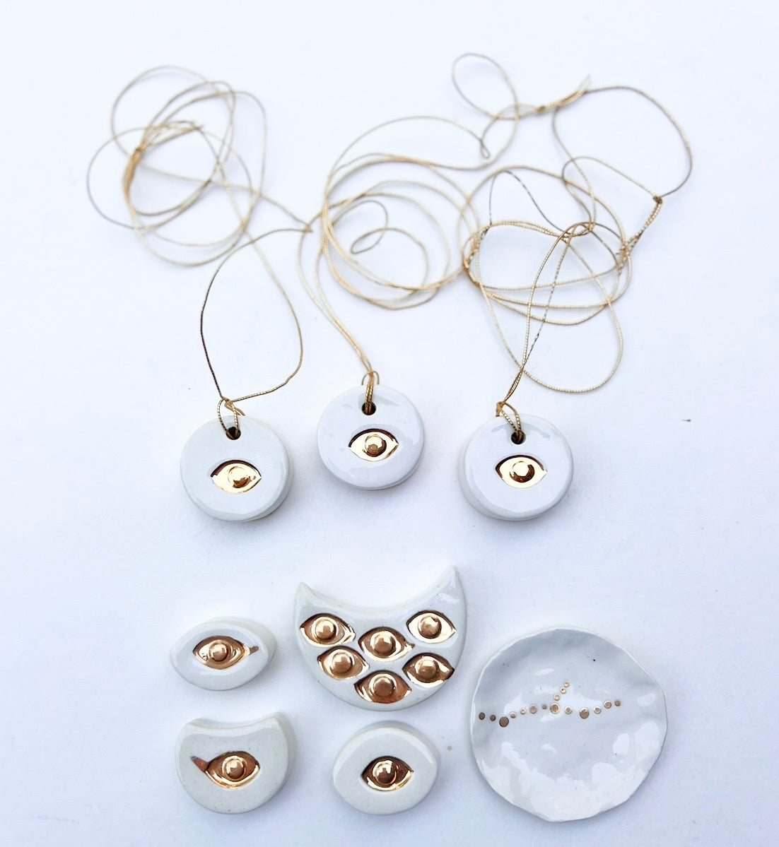 'talisman' gold lustre necklace &/or wall hanging piece