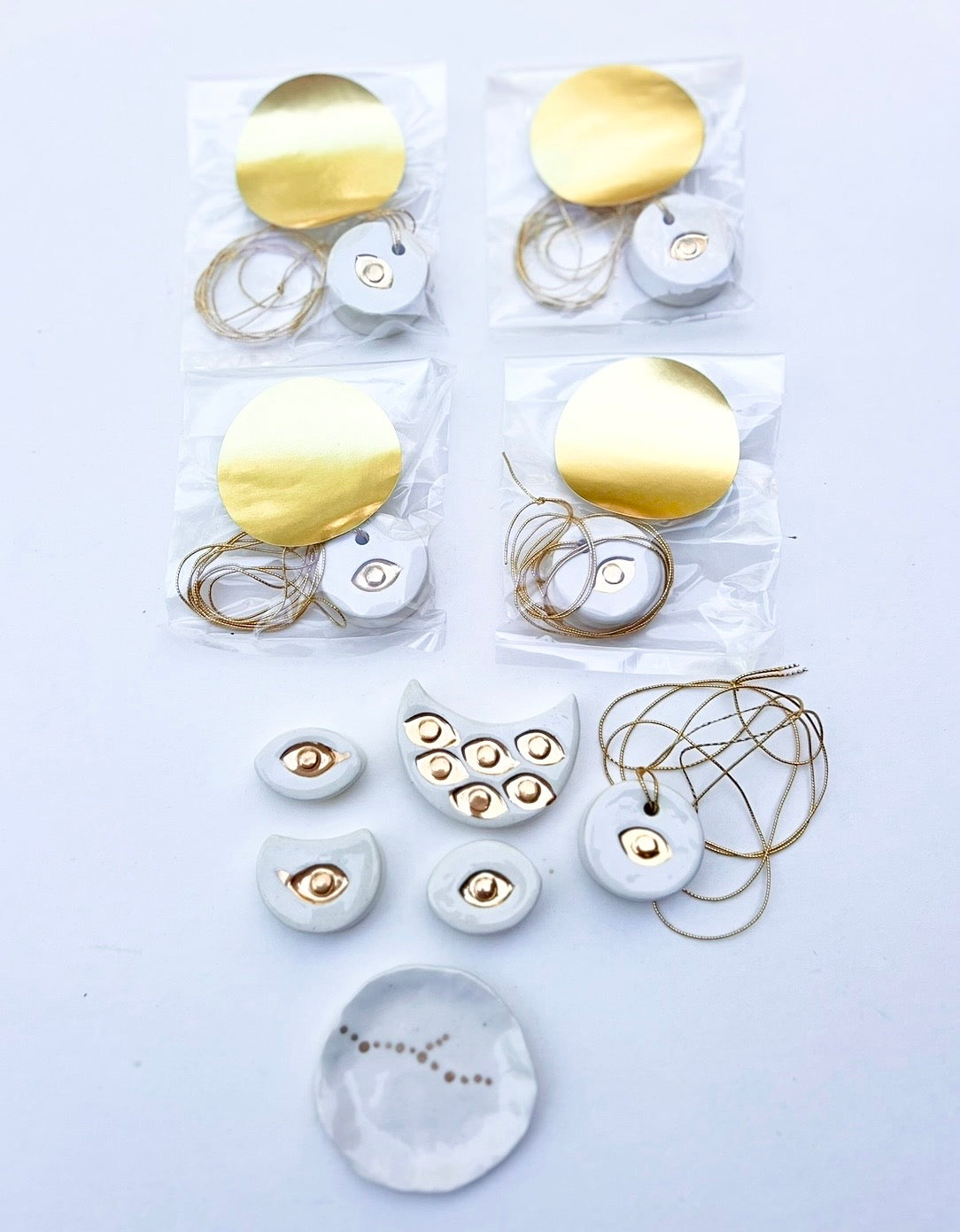 'talisman' gold lustre necklace &/or wall hanging piece