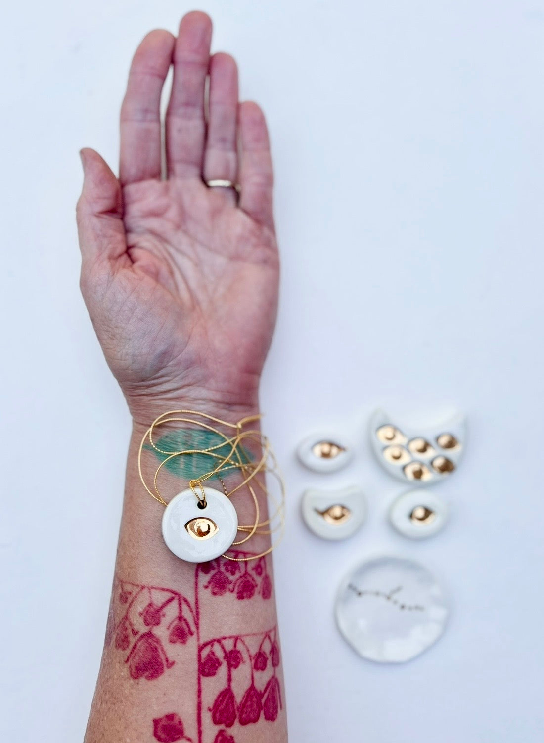 'talisman' gold lustre necklace &/or wall hanging piece
