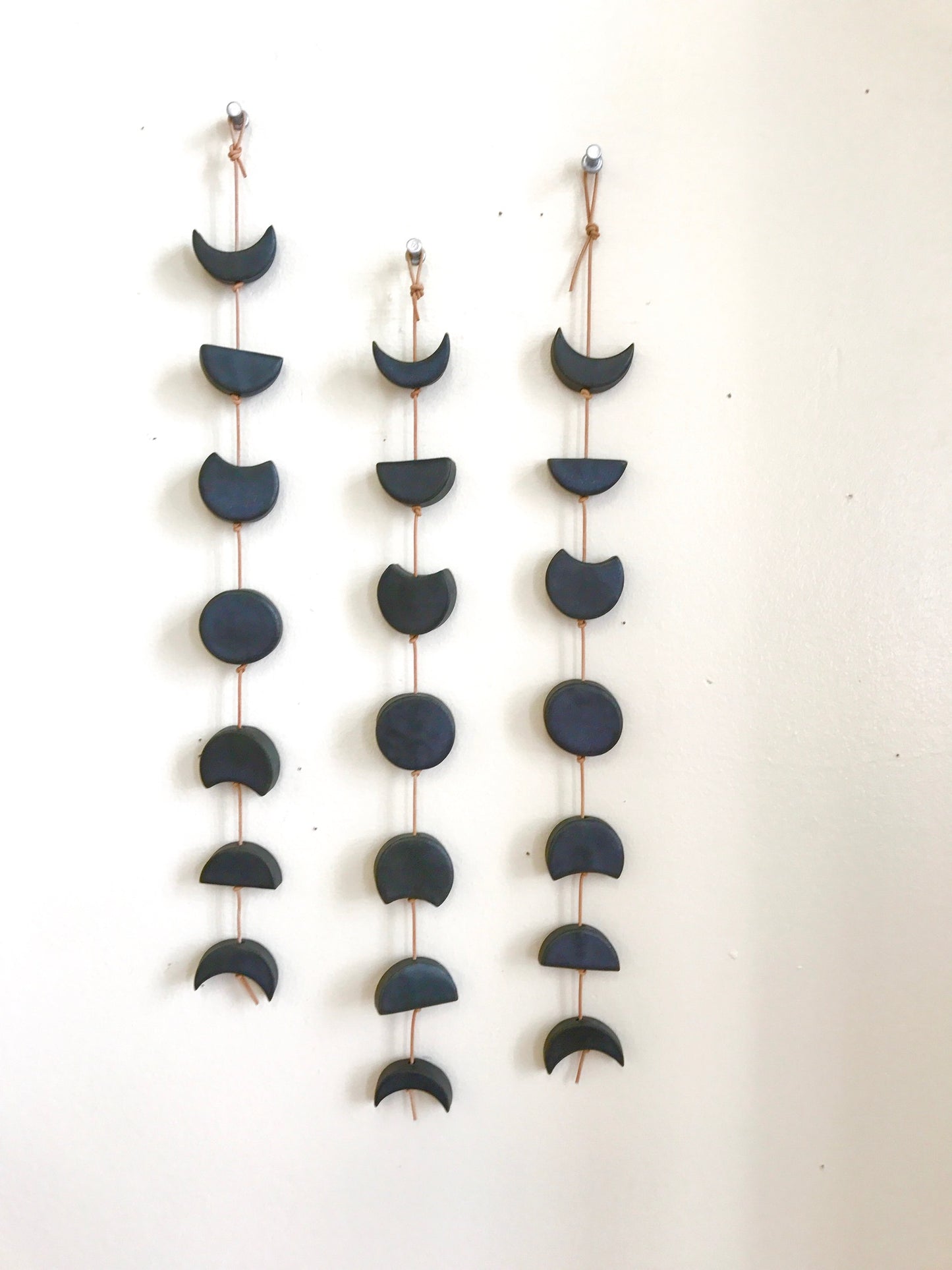 you are my moon; burnished steel ceramic moon phases vertical wall hanging