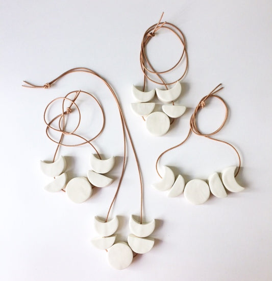 'loyal companion' mini moon phases all white ceramic necklace