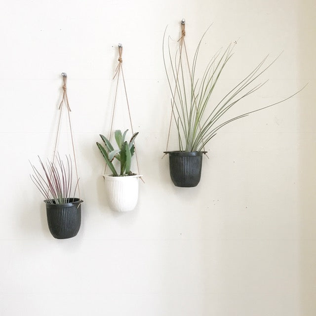 white or black hanging planter