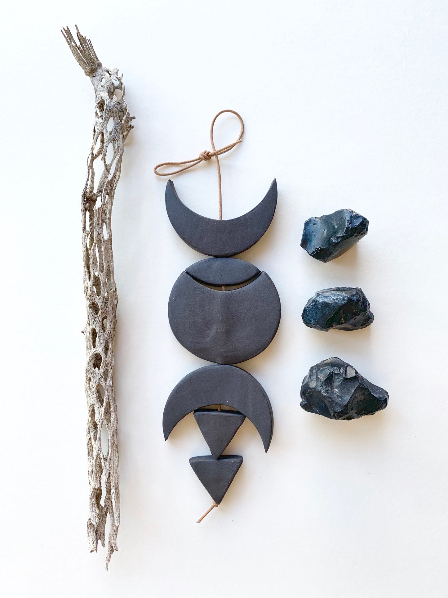 sold - one of a kind, black magic ceramic hanging