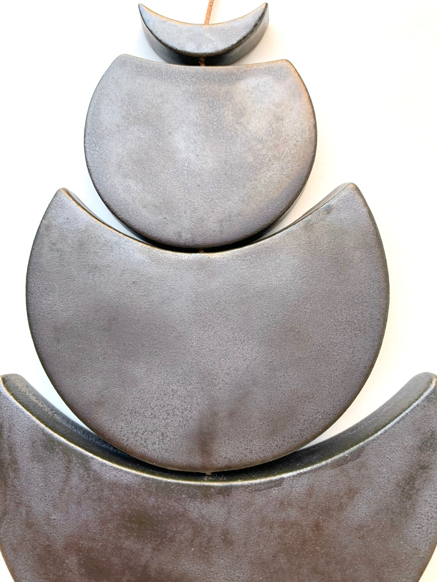 sold - one of a kind 'sea foam moons' burnished steel ceramic piece
