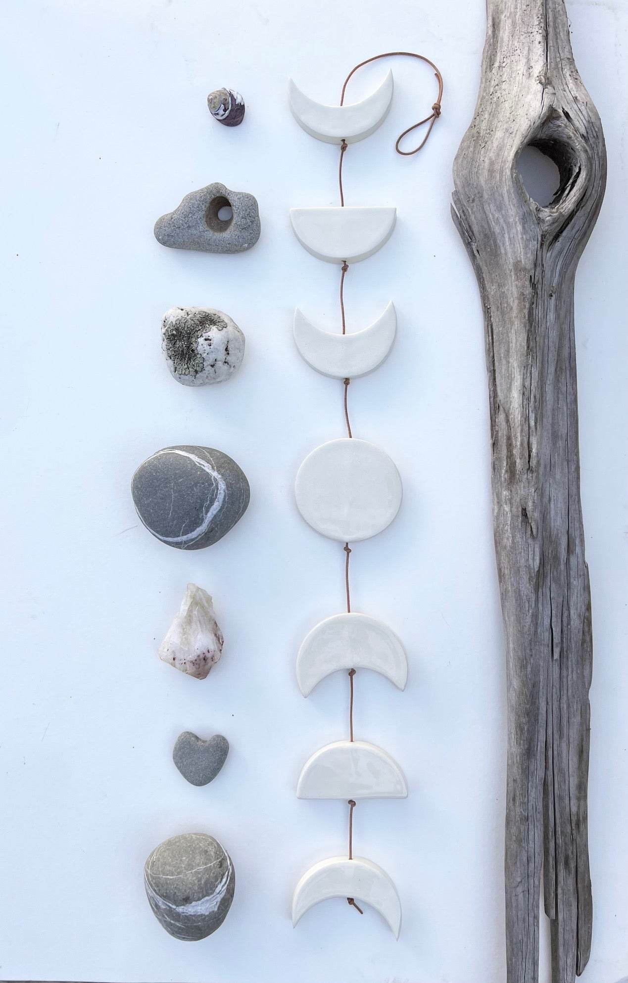 be calm, vertical moon phases wall hanging