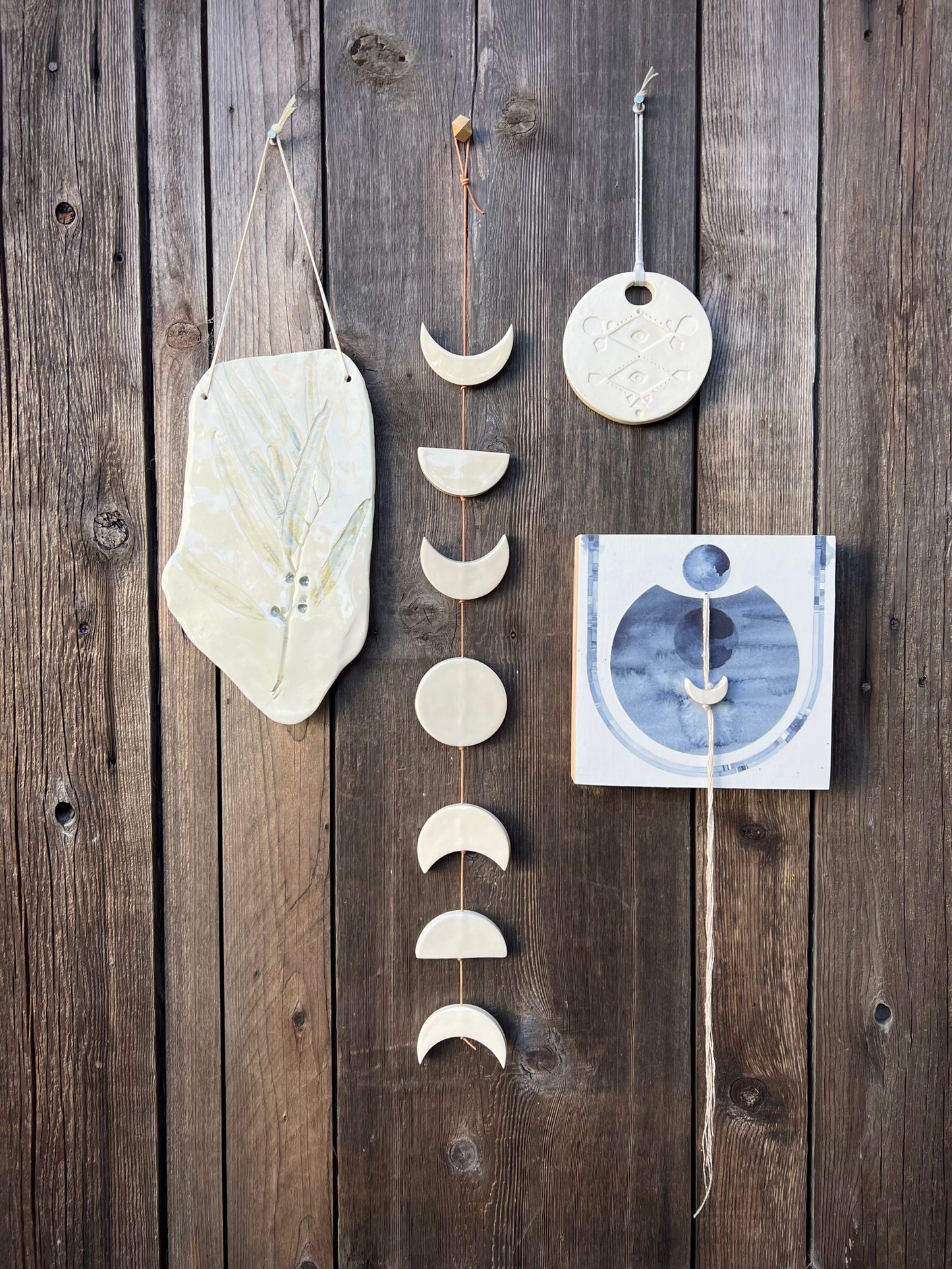 be calm, vertical moon phases wall hanging