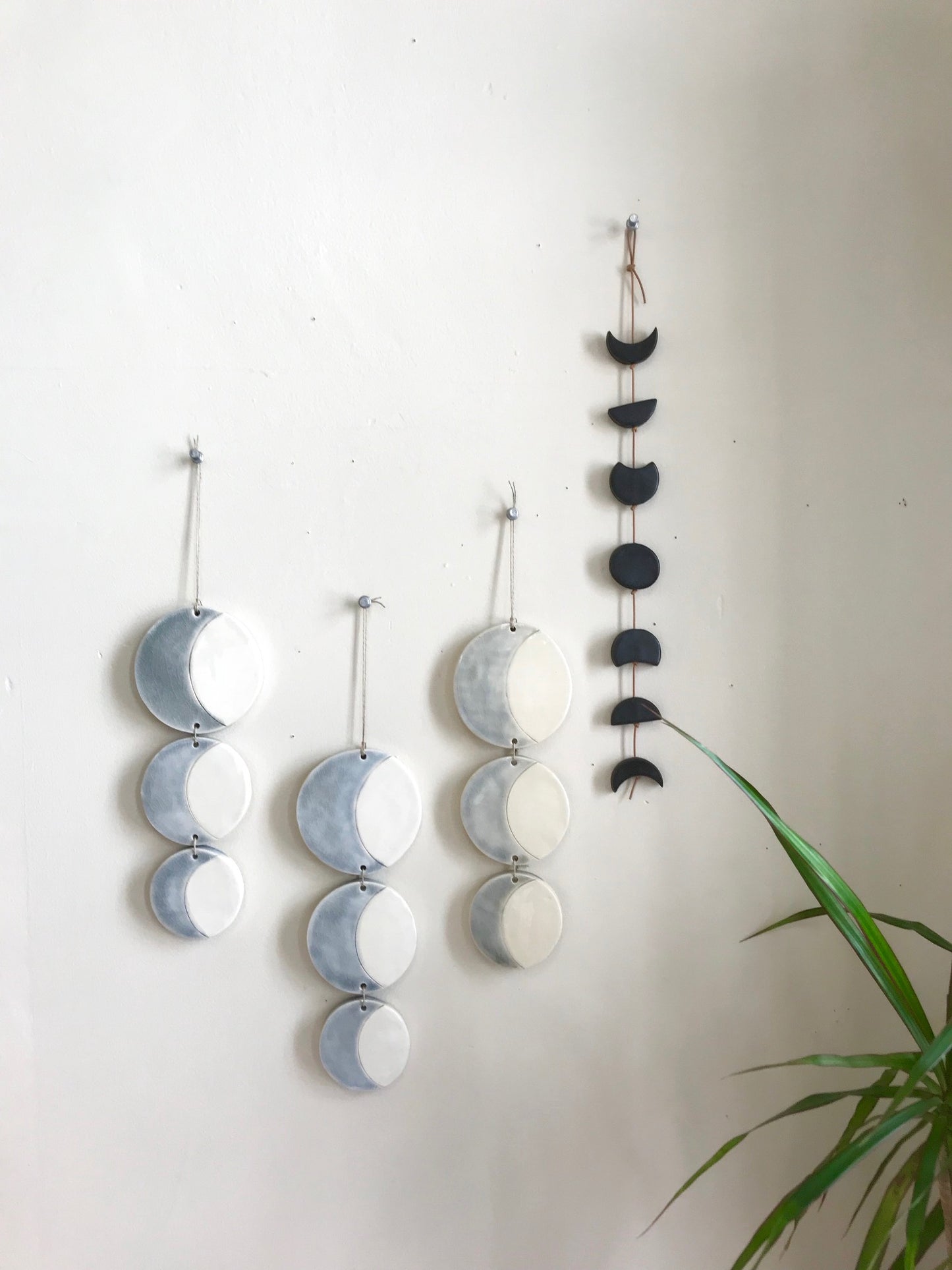 SOLD - triple silver sound of the crescent moon ceramic vertical wall piece