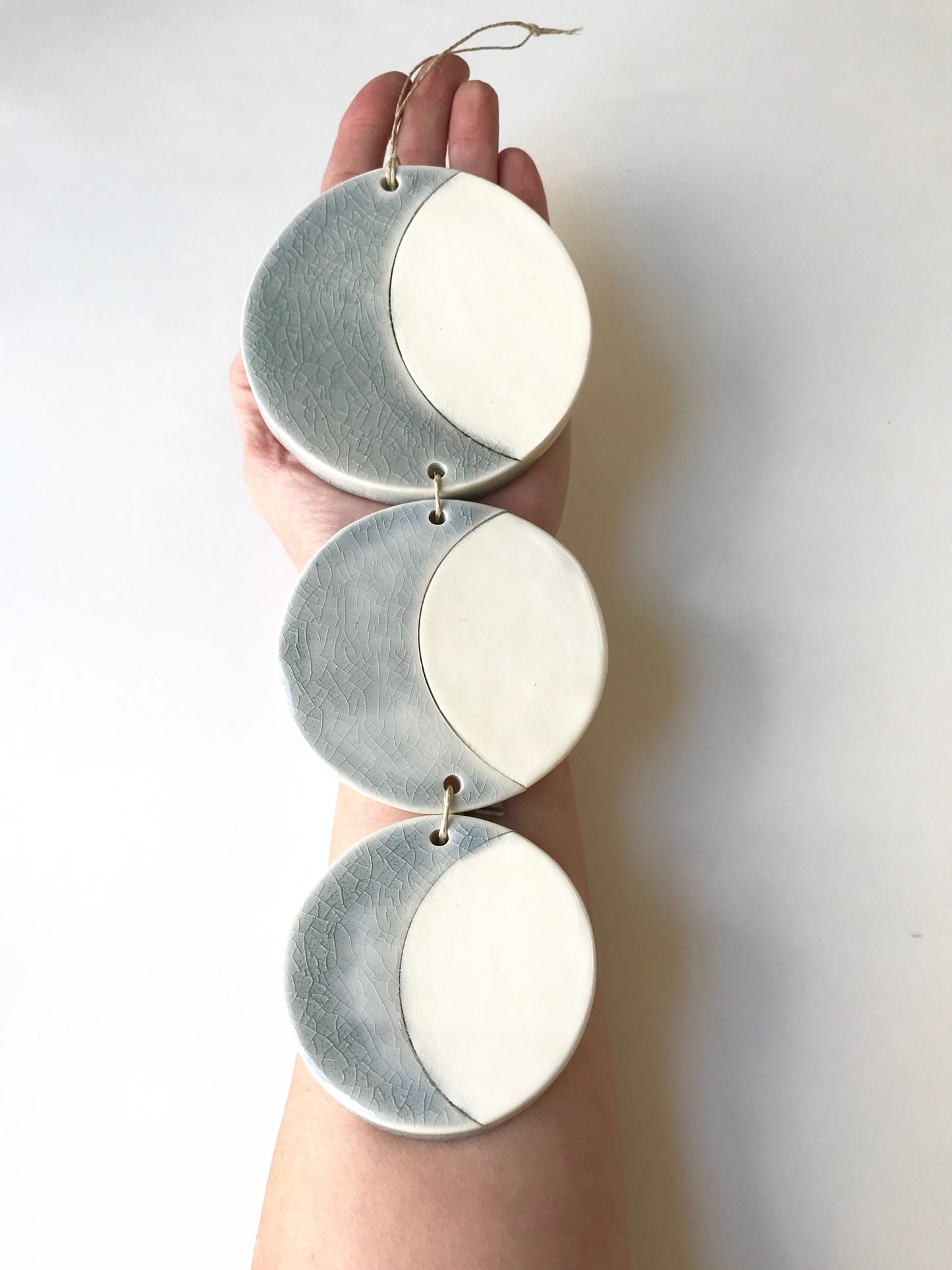 SOLD - triple silver sound of the crescent moon ceramic vertical wall piece